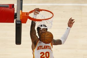 john collins hawks saída