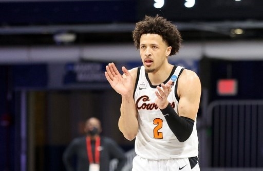 Cade Cunningham visita Pistons