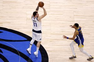 doncic mavericks passo título