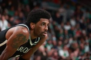 kyrie irving contrato nets