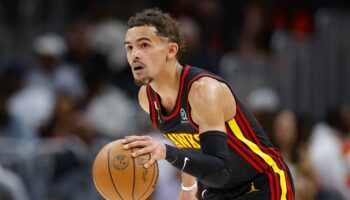 trae young hawks troca