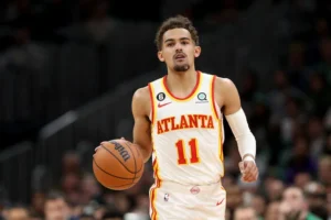 trae young hawks troca