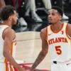 trae young dejounte murray hawks