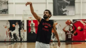 troca trae young hawks