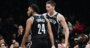 cam thomas nets troca