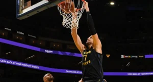 troca Kristaps Porzingis Warriors